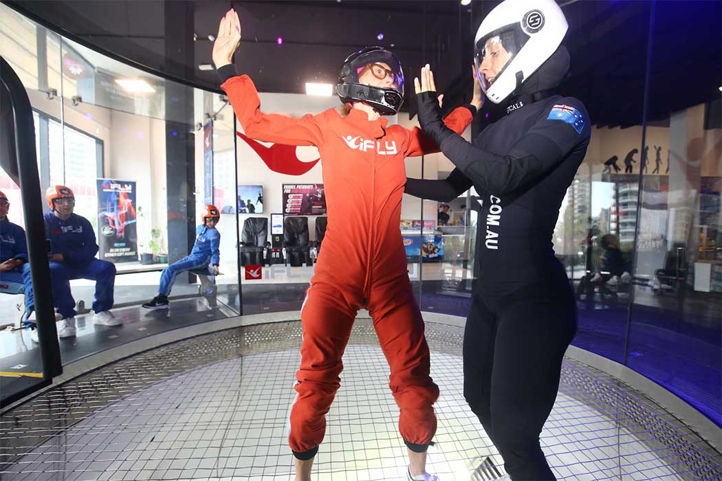 Joanne with instructor indoor skydiving